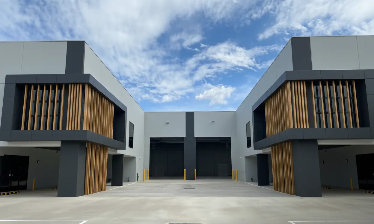 Completed industrial warehouse units with timber-clad facades